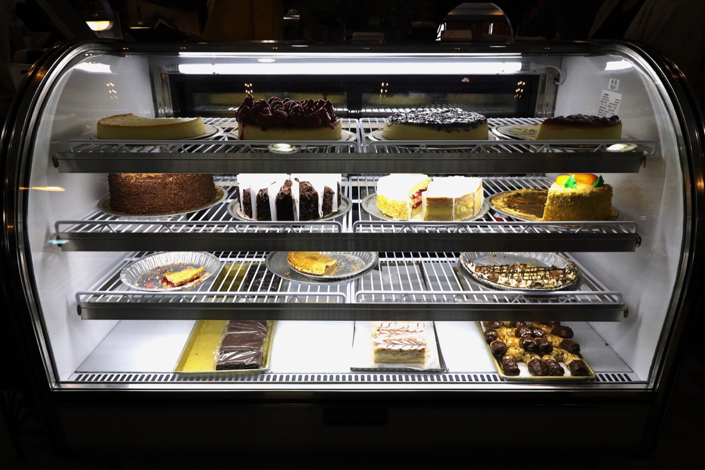 Kaz Americana dessert case filled with fresh cakes and pies