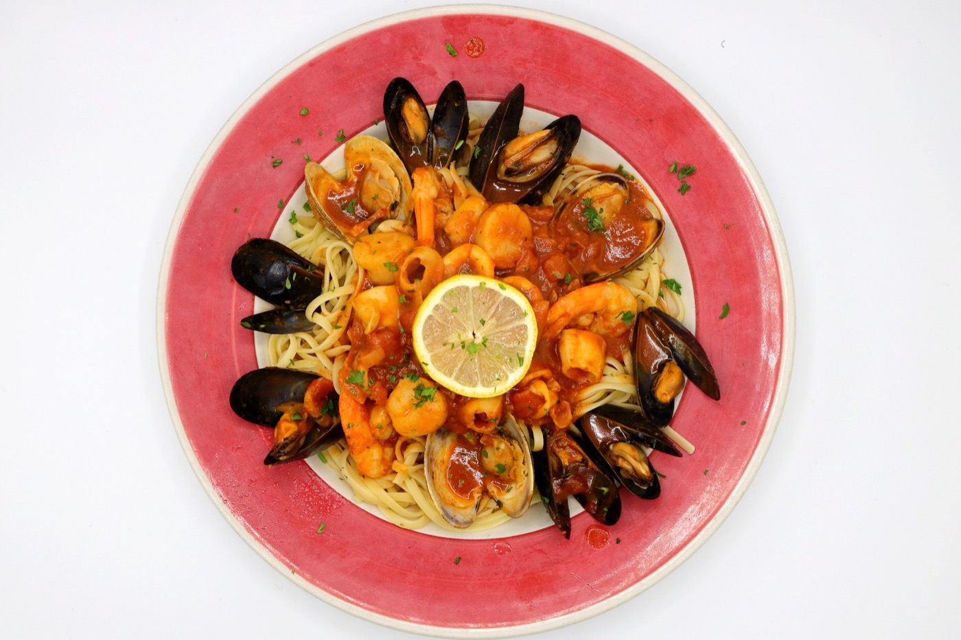Seafood pasta with mussels, shrimp, lemon, and herbs
